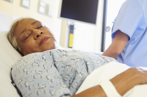 Lady in hospital bed