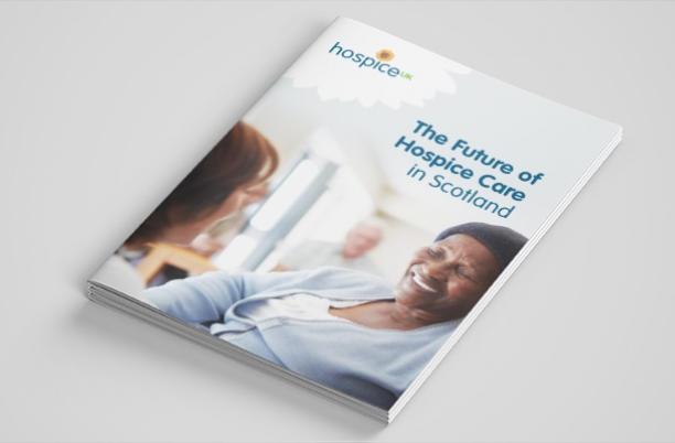 Hospice UK report lying at an angle on a table