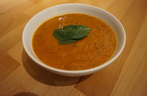 A stock photo of red pepper soup