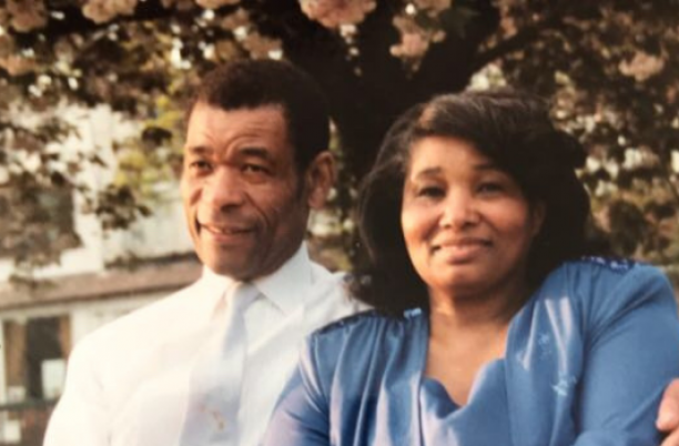 Maureen's parents sitting on a bench