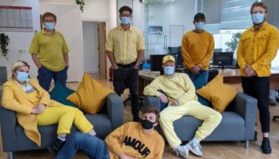 Staff at Raffolux wearing yellow for Hospice Care Week