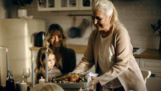 A stock photo of a family meal, to promote our Taste of Home campaign